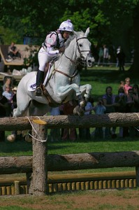 Gemma Tattersall and Jesters Quest jump the Open Ditch during the cross-country phase of Badminton Horse Trials 2007.